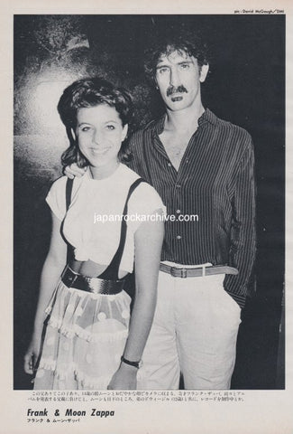 Black and white magazine photo pinup of Frank Zappa and Moon Unit Zappa